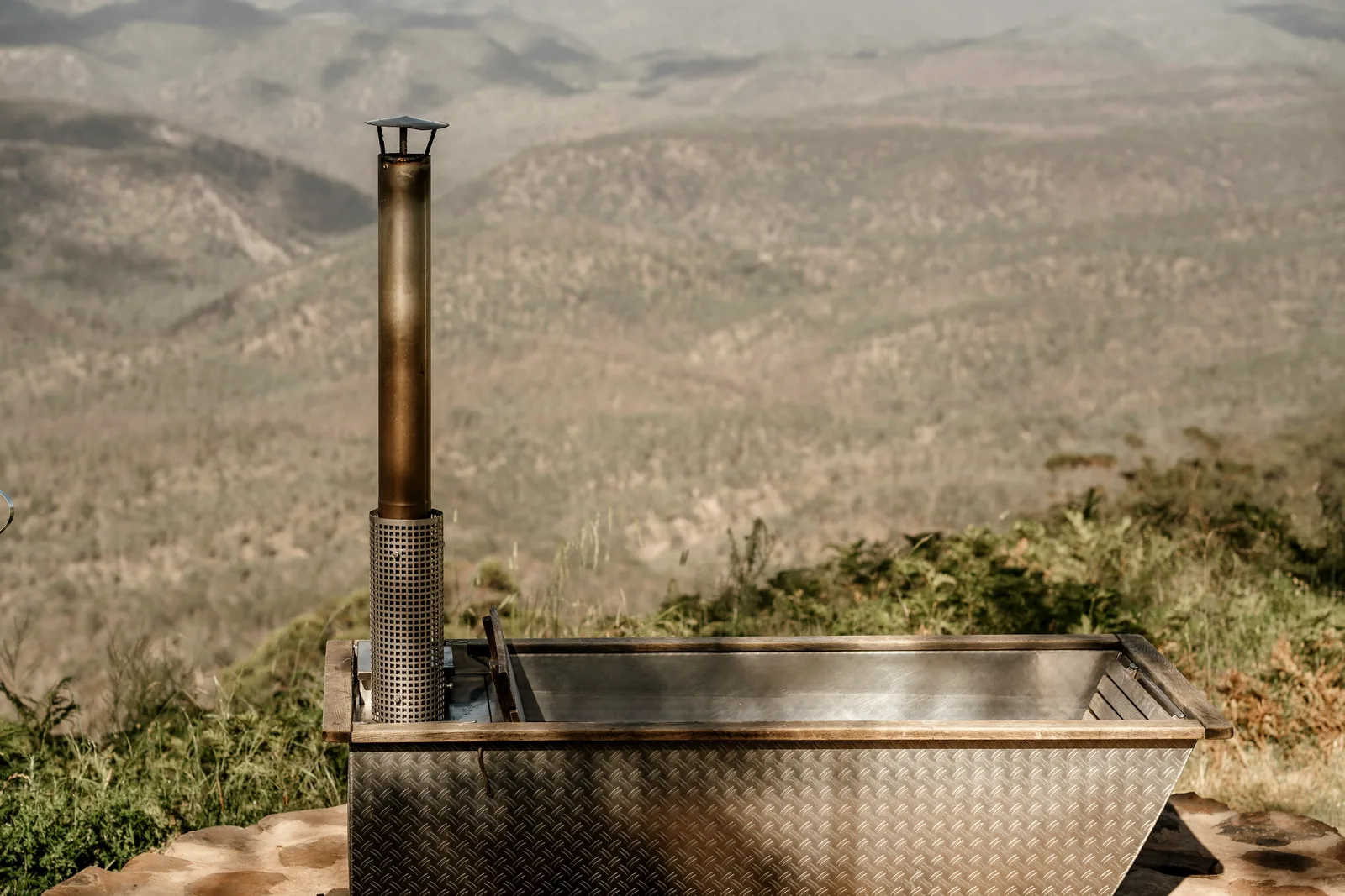 An outdoor bath overlooking the mountains
